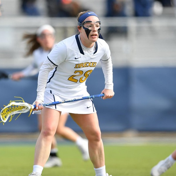 Nursing student Lucy Schneidereith on the lacrosse field
